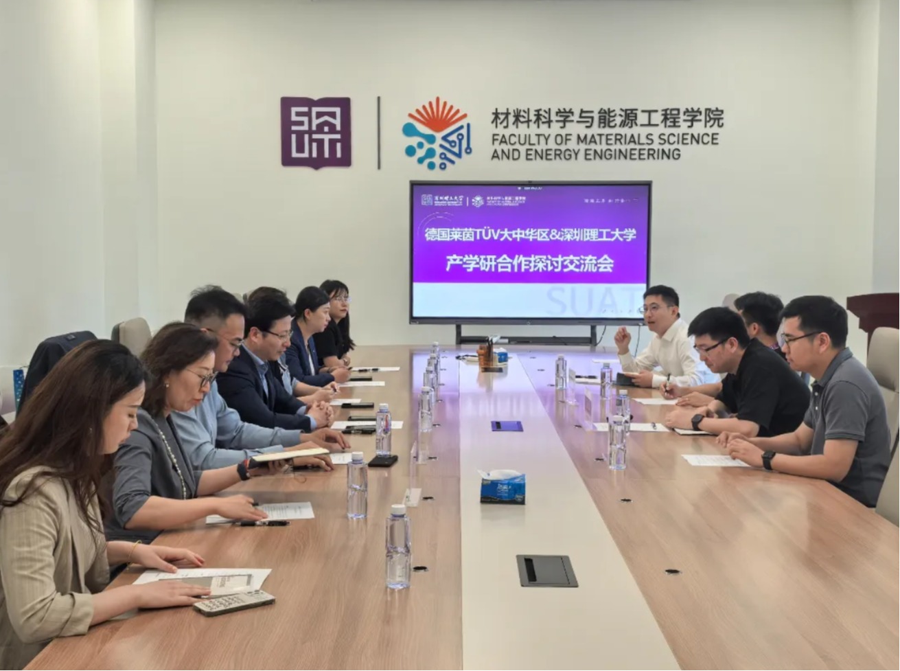 德国莱茵TÜV来访ug环球体育洽谈产学研合作